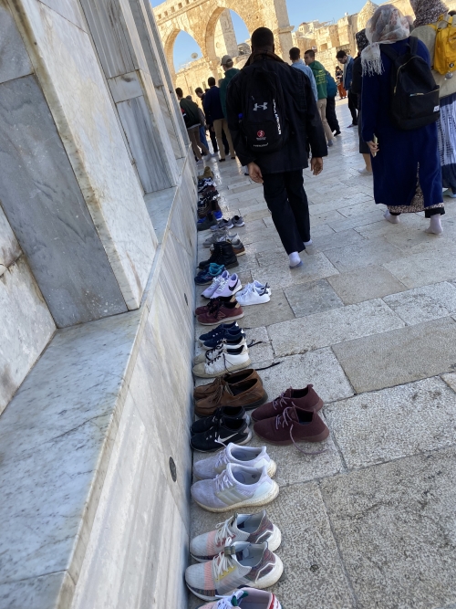 Shoes left outside a mosque